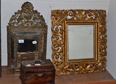 Lot 522 - A Georgian mahogany tea caddy; a gilt composition Florentine style mirror and a stamped brass...