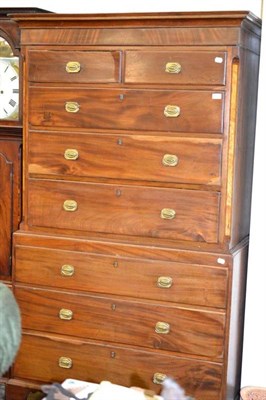 Lot 530 - A George III mahogany chest on chest, with two short over three long drawers, between canted...