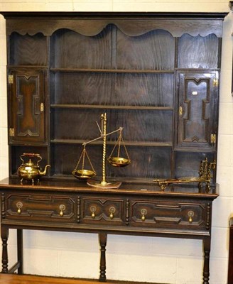 Lot 532 - A stained oak dresser base and rack