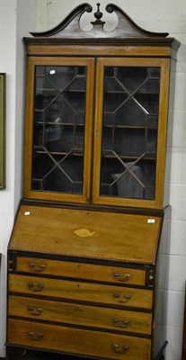 Lot 534 - An Edwardian inlaid mahogany bureau bookcase