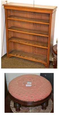 Lot 539 - Mahogany open bookcase and a circular footstool with upholstered cover