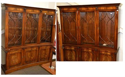 Lot 541 - Two mahogany reproduction concave glazed bookcases