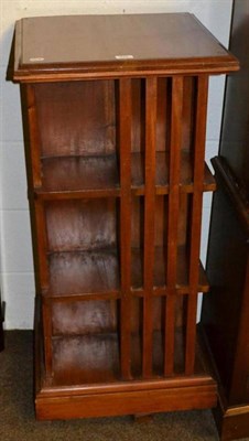 Lot 542 - A mahogany revolving bookcase