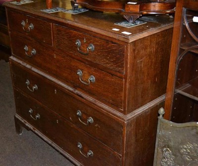 Lot 553 - A 19th century oak four height chest of drawers