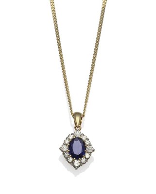 Lot 232 - An 18 Carat Gold Sapphire and Diamond Pendant on Chain, the pendant comprising an oval mixed...
