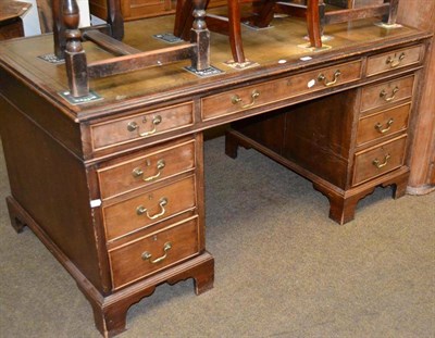 Lot 564 - Mahogany pedestal desk with leather top