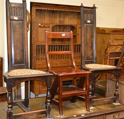 Lot 565 - A pair of oak hall chairs with painted backs and a mahogany chair/steps