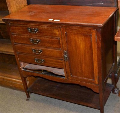 Lot 569 - An Edwardian walnut music cabinet