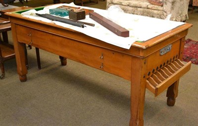 Lot 580 - A vintage oak framed bar billiards table complete with cues, balls, mushrooms and scoreboard