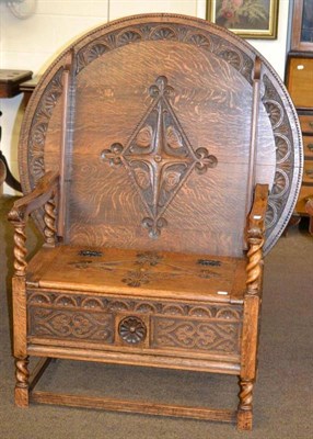 Lot 594 - A carved oak monk's bench