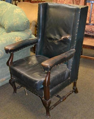 Lot 598 - Wing back arm chair in the George III style