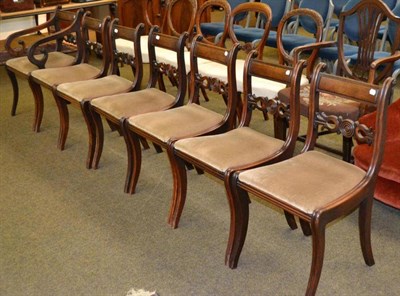 Lot 606 - Seven Regency mahogany dining chairs