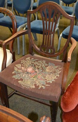 Lot 608 - A 19th century shield back elbow chair with its original needlework seat