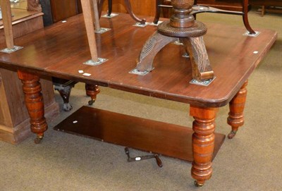 Lot 616 - A mahogany extending dining table (with alterations)