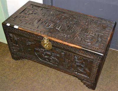 Lot 631 - A carved camphor wood chest