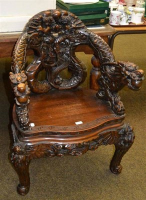 Lot 653 - A 20th century Chinese export carved wood ";dragon"; armchair