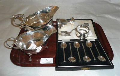 Lot 5 - Two silver sauce boats, a set of six silver teaspoons, a silver egg cup, Sterling spoon and a...