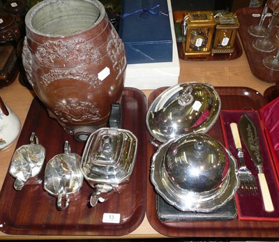 Lot 13 - A silver plated three piece tea service, a warming dish, muffin dish, serving items and a stoneware