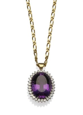 Lot 258 - An 18 Carat Gold Amethyst and Diamond Pendant on Chain, the oval mixed cut amethyst within a border