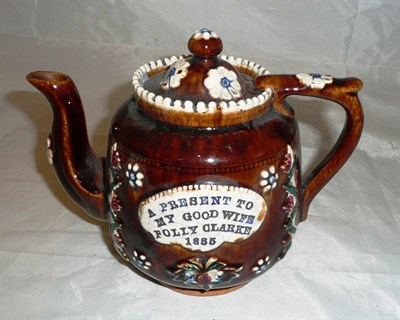 Lot 29 - Measham ware tea pot 'A present to my good wife Polly Clarke 1885'