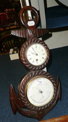 Lot 39 - Oak aneroid clock barometer in the shape of an anchor
