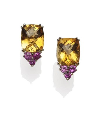 Lot 260 - A Pair of Citrine and Pink Sapphire Earrings, the facetted cushion shaped citrine surmounted by...