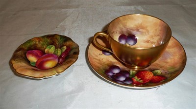 Lot 55 - A Royal Worcester fruit painted cup and saucer painted by E Townsend and a Royal Worcester...