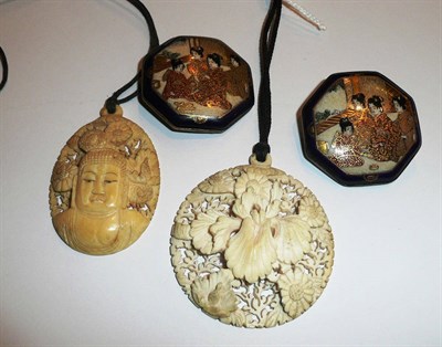Lot 74 - Two pre-1945 Chinese carved ivory pendants and a pair of Japanese Satsuma earthenware buttons