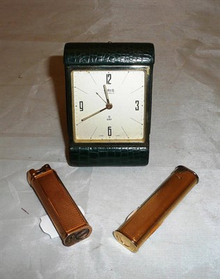 Lot 90 - Two Dunhill gilt metal lady's gas lighters and an Oris travel alarm
