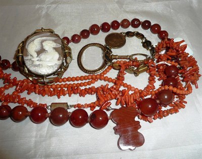 Lot 93 - Victorian shell cameo brooch, 19th century gilt quizzing glass, three coral necklaces, agate...