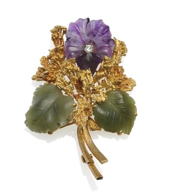 Lot 266 - A Floral Brooch, by Boodle & Dunthorne, a carved amethyst and diamond set flower in a textured...