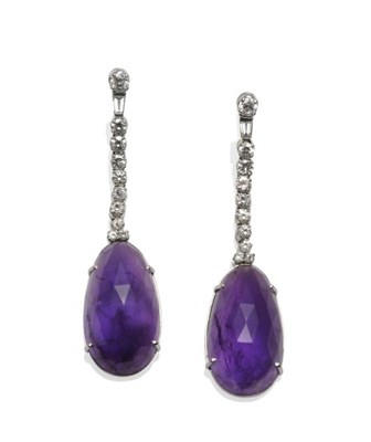 Lot 267 - A Pair of 18 Carat White Gold Amethyst and Diamond Drop Earrings, a row of round brilliant cut...
