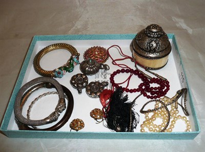 Lot 115 - Mainly Indian jewellery comprising: four silver and other bangles, a pearl necklace and another...