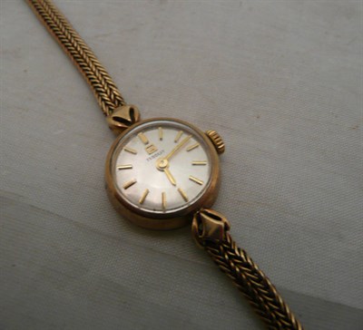 Lot 118 - A lady's 9ct gold wristwatch signed Tissot