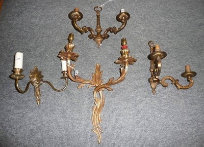 Lot 132 - A pair of twin branch wall lights and two other gilt wall lights (4)