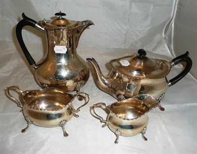 Lot 143 - A four piece silver tea and coffee set (matched jug)