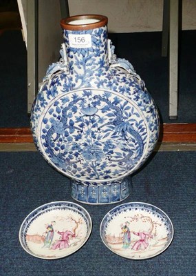 Lot 156 - A 19th century blue and white moon flask (a.f.) and a pair of Qianlong saucers