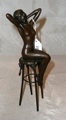 Lot 184 - Modern Art Deco style bronze of a nude maiden on a stool