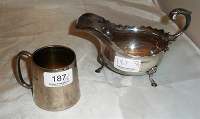 Lot 187 - Silver sauce boat and a silver christening mug