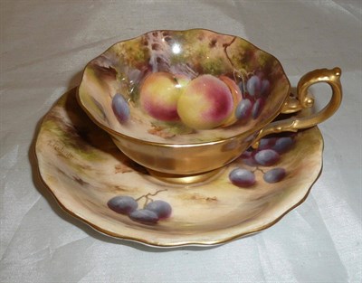 Lot 194 - Fruit painted Worcester cup and saucer