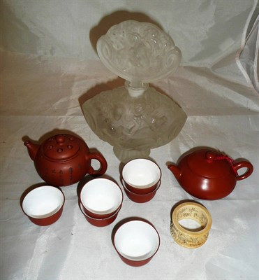 Lot 197 - A frosted glass scent bottle, two miniature teapots, six miniature tea bowls and a carved...