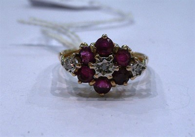 Lot 234 - A ruby and diamond ring