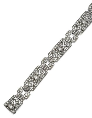 Lot 279 - A Diamond Bracelet, of articulated plaques set with marquise cut, brilliant cut and baguette...