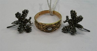 Lot 235 - A pearl set engraved band ring and a pair of marcasite butterfly earrings