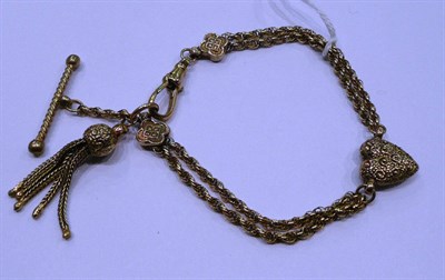 Lot 248 - A double rope twist bracelet with tassel and T-bar pendants