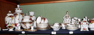 Lot 265 - Quantity of Royal Albert 'Old Country Roses', including tea wares, figures etc on a shelf