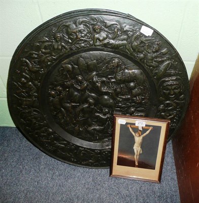 Lot 272 - A pair of large embossed brass chargers and a Baxter print 'The Crucifixion' (3)