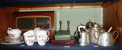 Lot 274 - Royal Crown Derby 'Derby Posies' tea set, two plated tea sets, a radio etc on a shelf