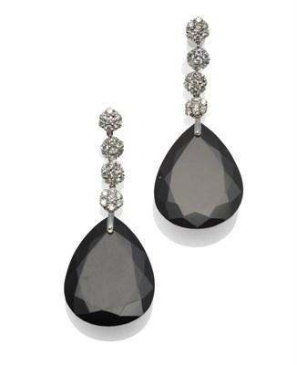 Lot 283 - A Pair of 18 Carat White Gold Onyx and Diamond Drop Earrings, four chain linked clusters of...