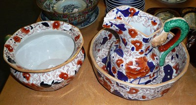 Lot 318 - An ironstone wash jug, bowl and chamber pot